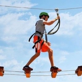 a person standing next to a traffic light