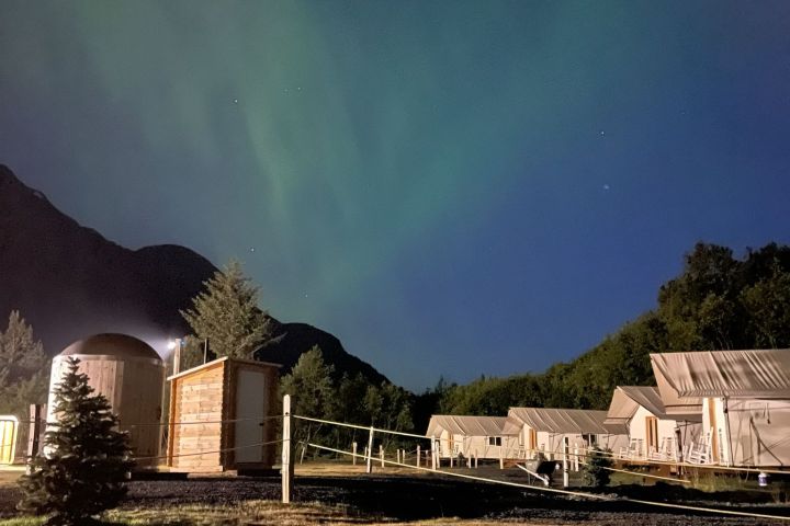 a castle on top of a grass covered field