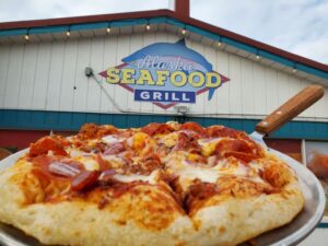 a pizza sitting on top of a table