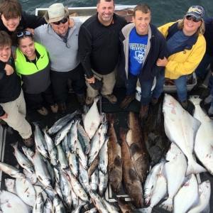 Andrew Lapthorne et al. posing for a fish