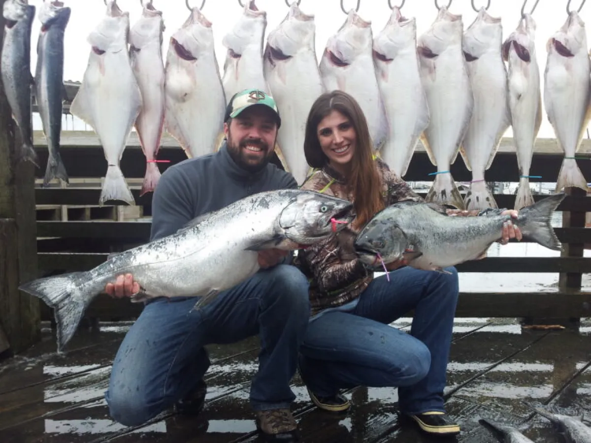a person holding a fish