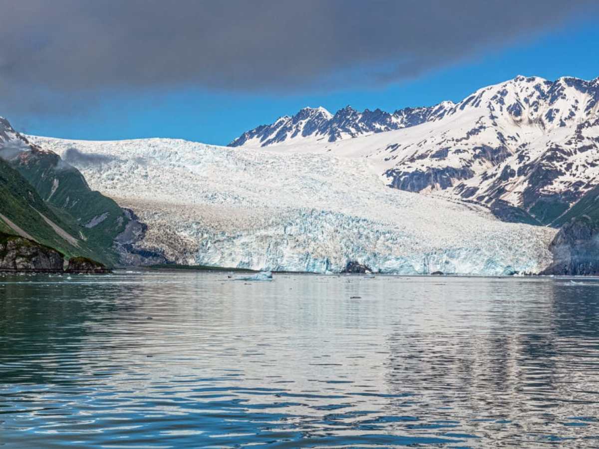 a lake with a mountain in the background